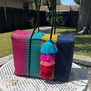 Multicolor weaved travel bag